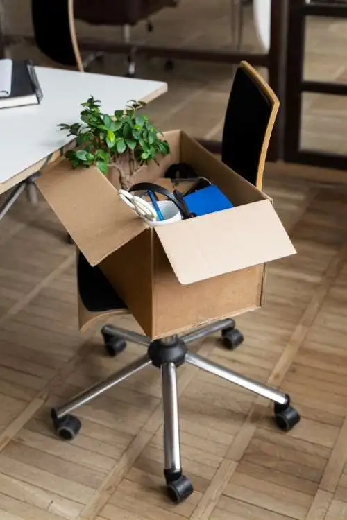 Cardboard box on chair for office Shifting in Ahmedabad